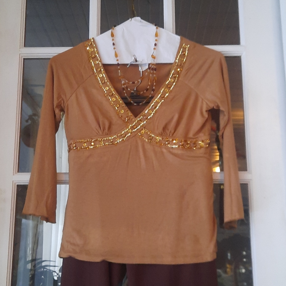 Beautiful form fitted tan color size "S" blouse